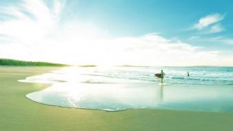 Summer surfing surfers blue skies warm beach wallpaper