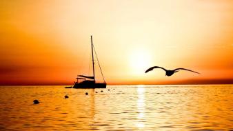 Boat silhouette sunset wallpaper