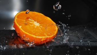 Color splash drops fruits oranges water wallpaper