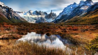 Grass glacier lagoon andes patagonia snowy peaks wallpaper