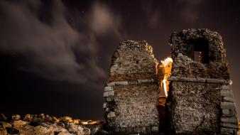Long exposure night sky stone buildings towers wallpaper