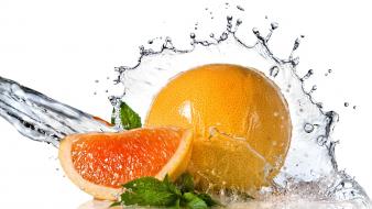 Orange fruit water splash wallpaper