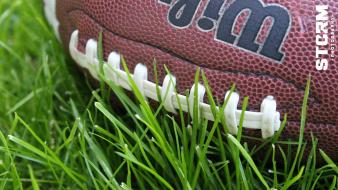 American football wilson balls brown grass wallpaper
