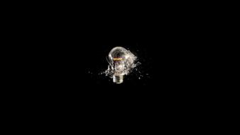 Black background explosion light bulbs simple wallpaper