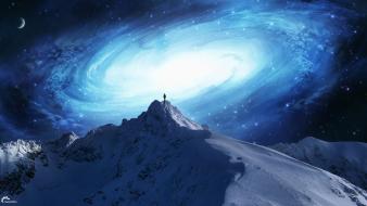 Blue galaxy over mountain wallpaper
