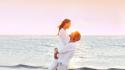 Brunettes sunset ocean couple embrace bracelets white clothes wallpaper