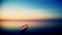 Row boats sea sunset wallpaper