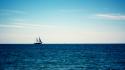 Blue skies sailing ships sea water wallpaper