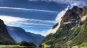 Blue skies chemtrails clouds hills houses wallpaper