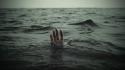 Hands drowning sea wallpaper