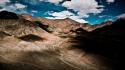 Clouds desert valley wallpaper