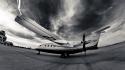 Black and white aircraft storm fisheye effect wallpaper