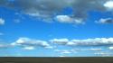 Clouds puffy blue skies wallpaper