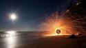 Beach night sparks time lapse wallpaper