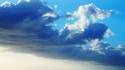 Clouds sunlight nuts strong skies sea wallpaper