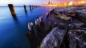 Light ocean stones logs twilight (time of day) wallpaper