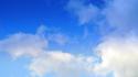 Blue clouds skies wallpaper