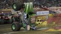 Cars around monster truck grave digger jam wallpaper