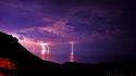 Pink violet eclipse lightning bolts skies sea wallpaper