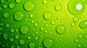 Abstract green water drops wallpaper