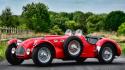 Vintage front angle view car j2 roadster wallpaper