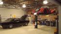 Cars lifted workspace garage wallpaper