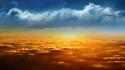 Sunset over clouds wallpaper