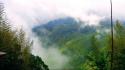 Mountains clouds landscapes nature trees houses fog skies wallpaper