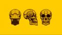 Skulls yellow spirals wallpaper