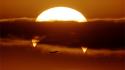 Sunrise clouds sun aircraft orange eclipse phillip skies wallpaper