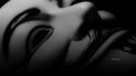 Anonymous grayscale masks text wallpaper